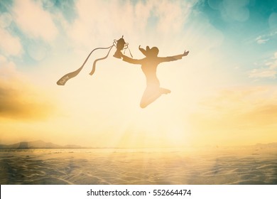 Silhouettes Happy New Victory Champ Women Hold Trophies Scholarship Jump On Summer Beach Concept For Success Kid Student Great Future, Good Behavior Support, Back To School College, Graduate Alumni.