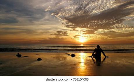 The Man Sitting Alone On The Beach High Res Stock Images Shutterstock