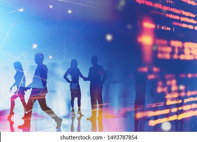Silhouettes of software developers over blue background with double exposure of code and network interface. Concept of programming. Toned image double exposure blurred