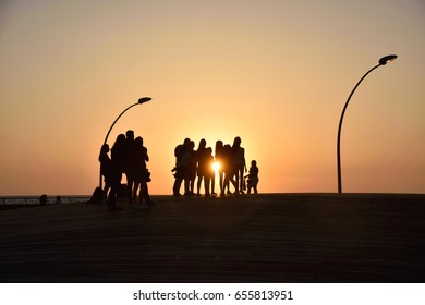 Silhouettes In Sunset Tel Aviv Port