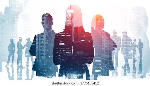 Silhouettes of three confident managers standing together in blurry abstract city with double exposure of cityscape and their team. Concept of leadership and international business. Toned image - Powered by Shutterstock