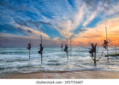 Silhouettes Of The Traditional Stick Fishermen At Sunset , Galle Beach , Sri Lanka 