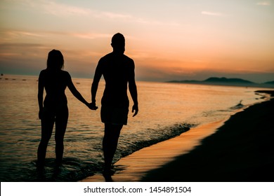 Silhouettes Young Couple Sea Stock Photo 1454891504 | Shutterstock