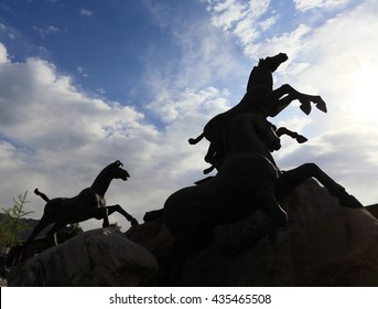 Silhoutte Statue Horse Running With Blue Sky 
