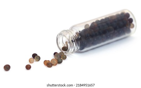 Silica Gel In A Small Glass Bottle Over White Background