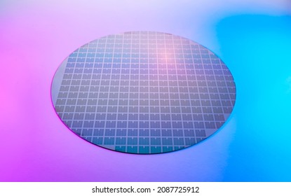 Silicon Chip Wafer Reflecting Different Colors