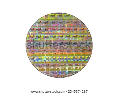 silicon wafer with microchips reflecting different colors.