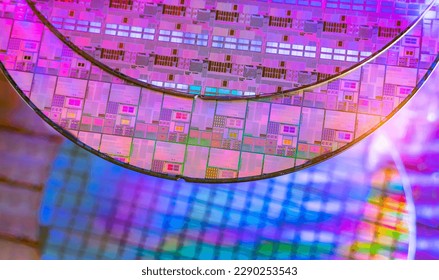 Silicon Wafers with microchips used in electronics for the fabrication of integrated circuits