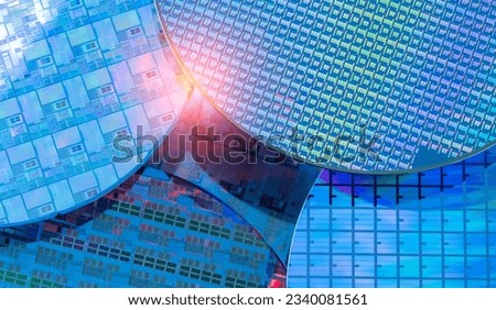 Silicon Wafers with microchips used in electronics for the fabrication of integrated circuits