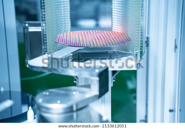 Silicon Wafers and Microcircuits\
with Automation system control application on automate robot\
arm