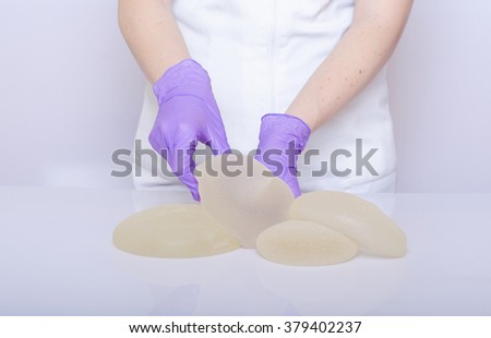 Silicone breast implant. Plastic surgery concept. Aesthetic surgery convept