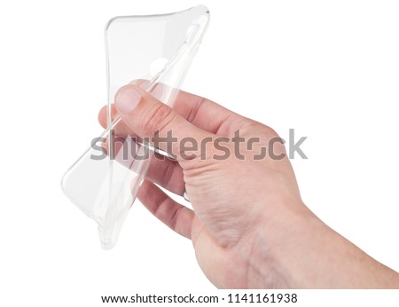 Silicone case for smartphone bent in his hand, isolated on white background.