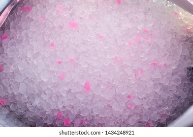 Silicone Cat Litter With White And Pink Granules In The Package