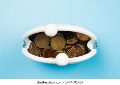 silicone coin purse on blue background - Shutterstock ID 1444591487