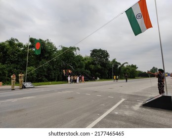 Siliguri, West Bengal India- July 08 2022: Flag hoisting ceremony organized at the India Bangladesh border connecting two countries by land. BSF and Bangladeshi national guard at international border.