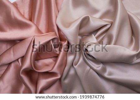 Silk bed sheets texture, pink silk fabric with decorative pleats