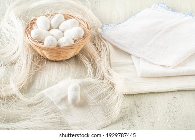 Silk cocoon the commercially bred caterpillar of silkworm moth, which spins a silk cocoon that is processed to yield silk fiber - Shutterstock ID 1929787445