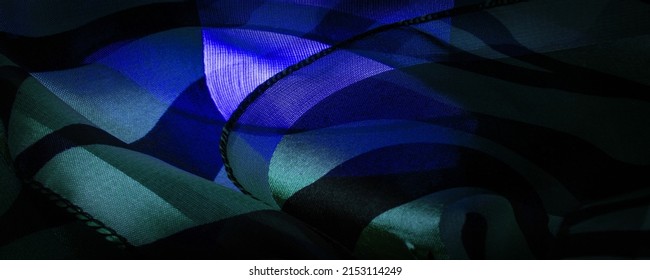 silk fabric in abstract green and blue-black colors. Abstract watercolor paint, painted textured vertical silk fabric, canvas, macro, close-up.Texture. Background. Pattern. - Shutterstock ID 2153114249