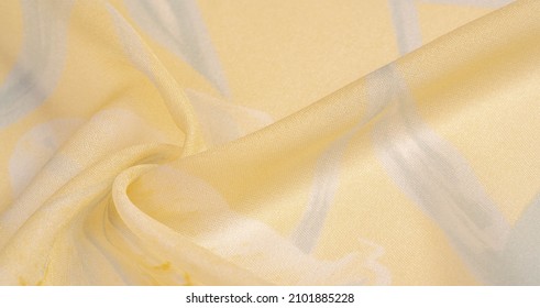 Silk fabric, yellow flowers on a white background. this delicate fabric in pastel colors will evoke decks and fancy. Texture, background pattern,