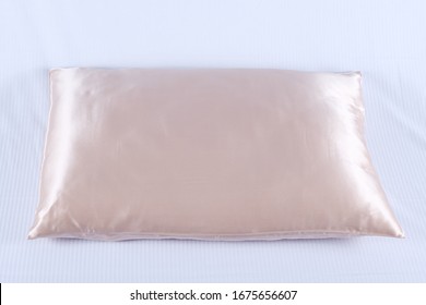 
Silk Pillowcase On A Pillow On A Gray Background