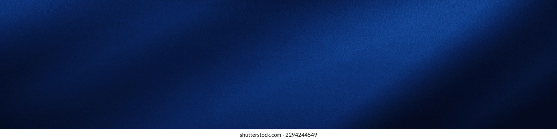 Silk satin fabric. Navy blue color. Abstract dark elegant background with space for design. Soft wavy folds. Drapery. Gradient. Light lines. Shiny. Shimmer. Glow.Template. Wide banner. Panoramic. 