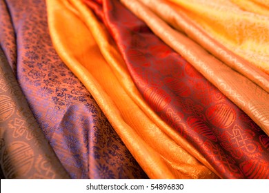 Silk scarves from India in a marketplace.