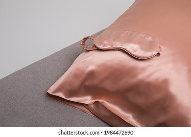 Silk sleep mask and pillow, soft silk cushion cover - Shutterstock ID 1984472690