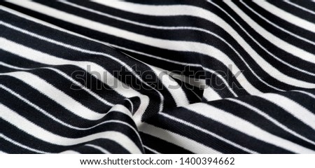 silk striped fabric. Black and white stripes. This beautiful, super soft silk blend of medium thick woven fabric is perfect for your design projects. It is brushed on the back for a luxurious feel