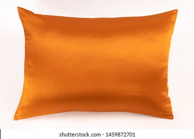 
Silky Case Orange Pillow On A White Background.