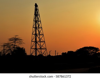  Sillhouette.Derrick Tower  In The Open Space. Preparation For Construction Industry And Business.