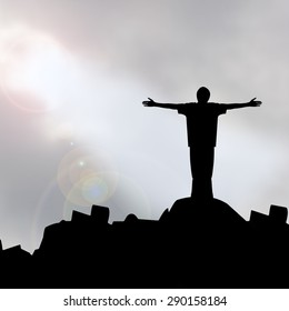 Sillouette Man With Faith Praying Under God Light