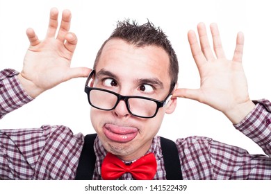 Silly cross-eyed nerd man making funny face, isolated on white background
