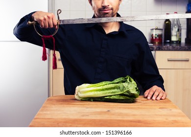 Silly Man Cutting Lettuce With Sword