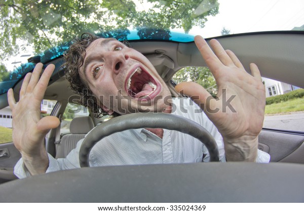 Silly
man gets into car crash and makes ridiculous
face