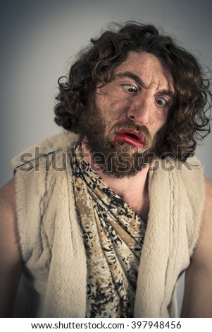 Silly realistic caveman with