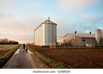 Silo in beautiful landscape with dramatically light placed in ploughed acres