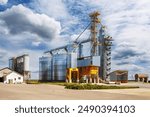 silos on agro-industrial complex with seed cleaning and drying line for grain storage. Granary elevator