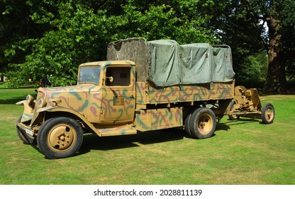 SILSOE, BEDFORDSHIRE, ENGLAND - AUGUST 14, 2021:  World War  2  German Citroen U23  Light Truck  With Pak36 Anti - Tank Gun  