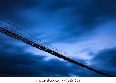 Siluette Rope Bridge In The Wind