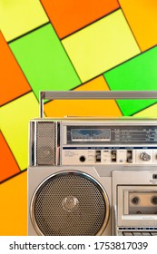 Silver 80s Radio Cassette On A Colorful Background. Play Music Concept.