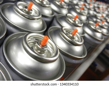 Silver Aerosol Cans On Production Line 