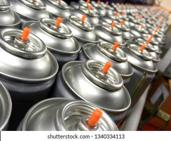 Silver Aerosol Cans On Production Line 