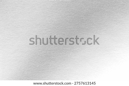 Silver background foil leaf metallic texture wrapping paper shiny glowing white grey solid reflective gradient color metal pattern backdrop for wallpaper decoration element backdrop