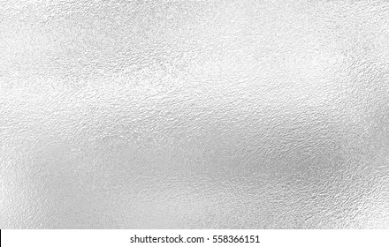 Silver background from metal foil on cardboard decorative texture