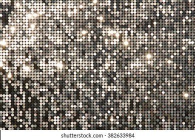Silver background mosaic with light spots