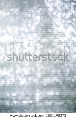 Silver bokeh abstract background copy space