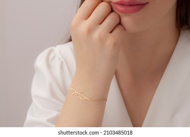 Silver Bracelet With Name Written On The Woman's Wrist. Jewelry Images That Can Be Used In E-commerce, Online Sales And Social Media.