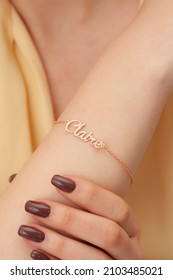 Silver Bracelet With Name Written On The Woman's Wrist. Jewelry Images That Can Be Used In E-commerce, Online Sales And Social Media.