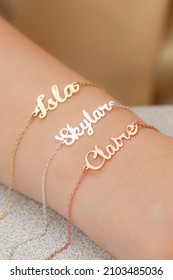 Silver Bracelet With Name Written On The Woman's Wrist. Jewelry Images That Can Be Used In E-commerce, Online Sales And Social Media.