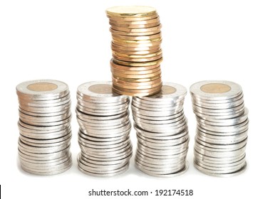 Silver and brass coins stack on white background